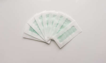 Hair depilation wax strips on a white background. Top. Close-up. Stock photo.の写真素材