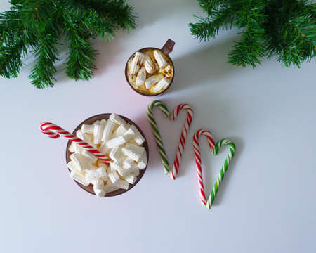 Christmas background, greeting card with a Cup of coffee or hot chocolate with marshmallows, a red...