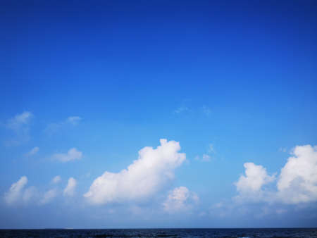 Bright blue sky with beautiful white clouds Summer photo.の写真素材