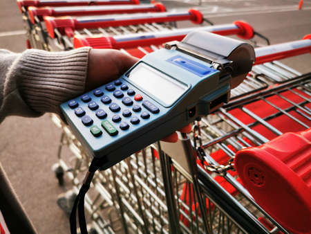 Woman Typing by Payment Machine, POS Terminal Confirms the Contactless Payment by Debit Credit Card,...