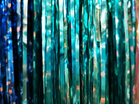 Beautiful tinsel, great design for any purposes. New year card. Bright tinsel, Christmas background, shiny pattern. Colorful decoration. Christmas decoration. Winter background. Xmas light pattern.の写真素材