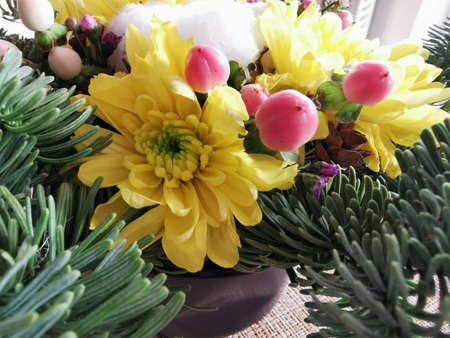 Christmas wreath for celebration decoration design. Christmas seasonal plant. White background. Xmas decoration element. Holiday, new year. Happy new year symbol. Decorative color art.の写真素材