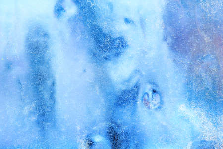 Frost pattern on the glass. Frost on the window. Winter photo. Cryesthesia. Freezing. Macro