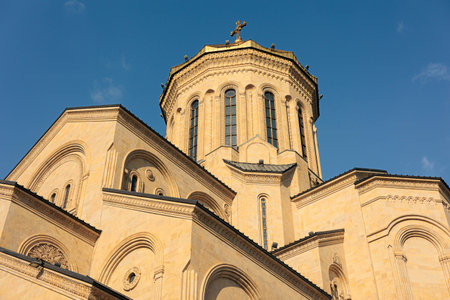 The Holy Trinity Cathedral of Tbilisi (Tsminda Sameba). the main Cathedral of the Georgian Orthodox Church. sunny weather, against the blue skyのeditorial素材