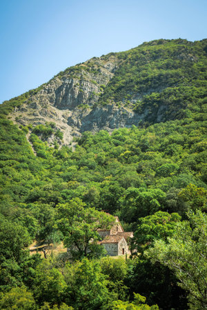 Ancient Armazi Monastery hidden in lush green forest near Mtskheta, Georgia. Peaceful spiritual...