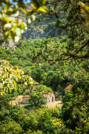 Ancient Armazi Monastery hidden in lush green forest near Mtskheta, Georgia. Peaceful spiritual...