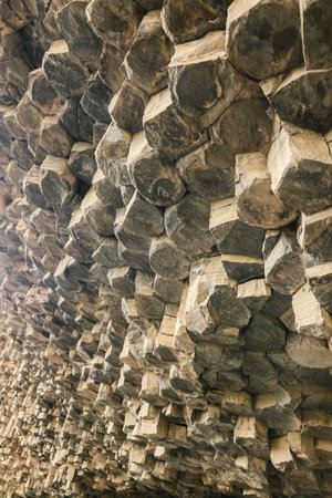 Close-up of hexagonal basalt columns in Garni Gorge, Armenia. This volcanic rock formation reveals natureの写真素材