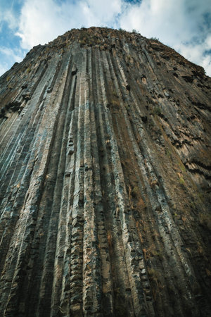 Towering basalt cliffs rise dramatically into the sky in Garni Gorge, Armenia. The Symphony of...