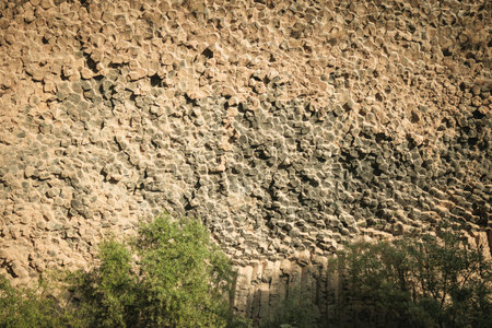 Abstract close-up of hexagonal basalt columns in Garni Gorge, Armenia. This volcanic rock formation, known as the Symphony of Stones, reveals natureの写真素材