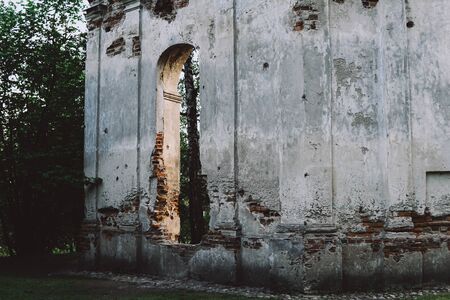 The ruins of Chapel of the XXII century, located in Loshitsky park, Belarus. The walls look mysterious.の写真素材