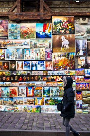 Krakow Cracow, Poland: December 30th 2016 - artwork seller in the street of Old Town fo Cracow Krakow Polandのeditorial素材