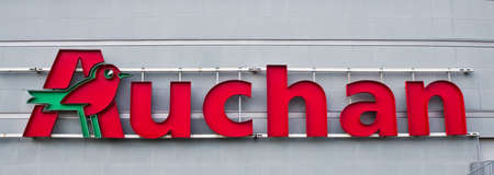 Poznan/Poland - February 7th 2019: King Cross Marcelin shopping mall, Auchan signのeditorial素材