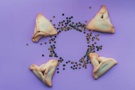 Hamantaschen cookies or hamans ears for Purim holiday celebration . top view.