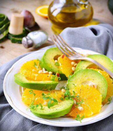Avocado and orange saladの写真素材