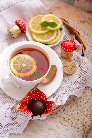 Cup of tea on a pillowの写真素材