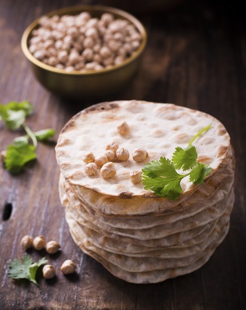 Tower thin crispy loaves of useful home cakes with chick-pea flour for home vegetarinskogo and...