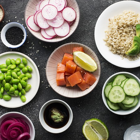 Fresh ingredients for rice edamame salmon poke bowl. Top view.の写真素材