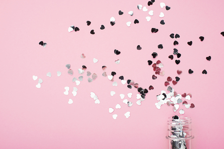 Festive pink background with silver glitter hearts. Ready concept for your project. Horizontalの写真素材