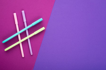 Background design symbol tag communication hashtag made from colored pencils on a trendy colored...