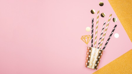 Paper cups cocktail tubes. Universal modern trend concept background of a holiday, rest, party, beach two colors. Horizontal, copy space. Flat layの写真素材