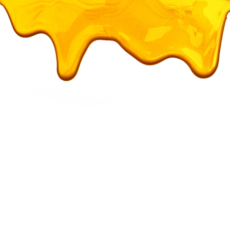 Liquid golden texture isolate on whiteの写真素材