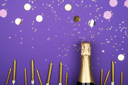 Champagne candles confetti celebration pastelの写真素材