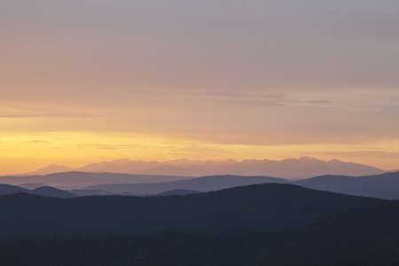 Beautiful sunrise landscape photo taken in Beskidy mountains - Wielka Racza, during summer.