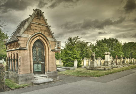 Old cemetery angel sculpture made of stoneの写真素材