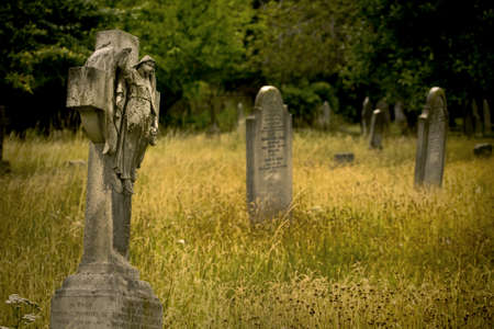 Old cemetery angel sculpture made of stone