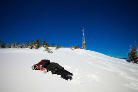Happy young woman funny portrait in beautiful mountain landscape taken in polish Beskidy mountain during sunny day.の写真素材