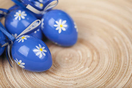 Happy Easter and spring concept colorful photo. Easter concept greetings or wishes card with beautiful blue eggsの写真素材