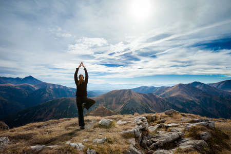 Yoga in Tatry mountains. Beautiful panorama, Czerwone Wierchy, Cervene vrchyの写真素材