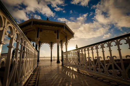 Sunset view on beautiful Brighton bandstand during sunny day, with blue skyの写真素材