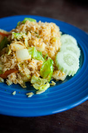 Fresh made squid barbeque skewer in hand. Traditional thai cuisine.の写真素材