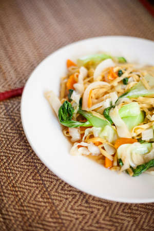 Stir fried vegetables with egg noodles. Traditional khmer cuisine.の写真素材