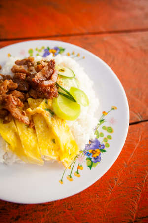 Fresh fried dried pork served with egg omelette. Traditional khmer cuisine.の写真素材