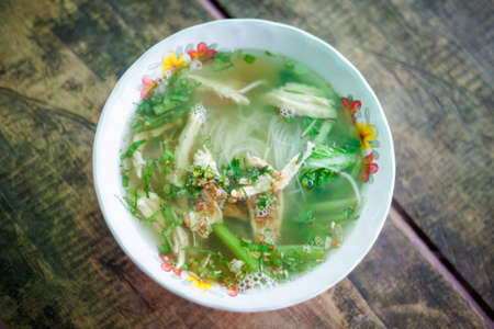 Hot cambodian broth glass noodles. Traditional khmer style soup.の写真素材