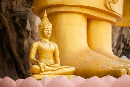 Sculpture of gold thai Buddha in Hua Hin in Thailand. Religion symbol of south east Asia.の写真素材