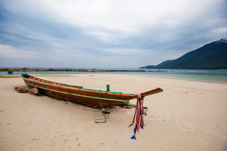 Summer seascape with boat on tropical island Koh Phangan in Thailand. Chalokum beach landscape.の写真素材