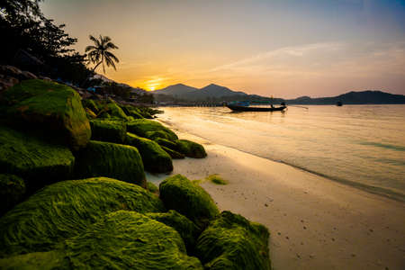 Beautiful sunset on tropical island Koh Phangan in Thailand. Chalokum beach landscape.の写真素材