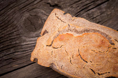 Homemade DIY natural vegan very healthy bread made of buckwheat, water and satl on a wooden table