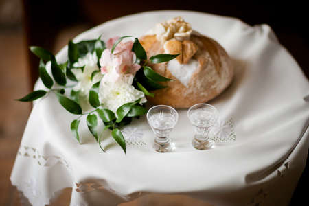 Wedding bread, salt and wodka detail - traditional polish inviting to Bride and Groom.の写真素材