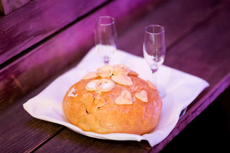 Wedding bread with salt and wodka detail - traditional polish inviting to Bride and Groom.の写真素材