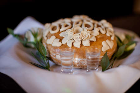 Wedding bread with salt and wodka detail - traditional polish inviting to Bride and Groom.