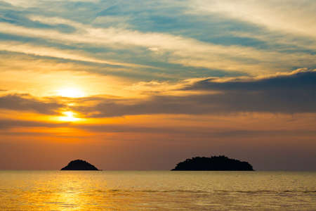 Summer sunset landscape on tropical koh Chang island  in Thailand. Seascape taken from Kai Bae beach.の写真素材