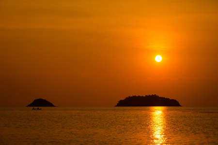Summer sunset landscape on tropical koh Chang island  in Thailand. Seascape taken on Kai Bae beach.の写真素材