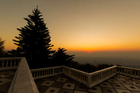 Beautiful buddhist Wat Phra That Doi Suthep temple in Chiang Mai in northern Thailand. Pictures of religion architecture in south east Asia during sunrise.の写真素材