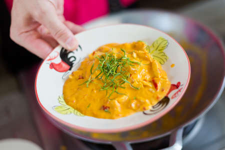 Fresh cooked hot Panang curry. Picture of traditional thai cuisine made of fresh ingredients taken during cooking class in Chiang Mai.の写真素材