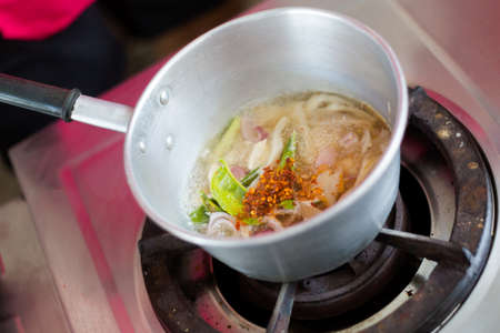Fresh made thai spicy soup. Picture of traditional thai cuisine made of fresh ingredients taken during cooking class in Chiang Mai.の写真素材