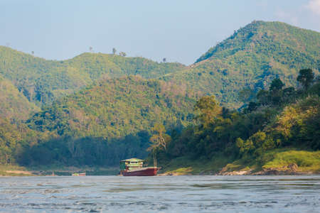 Beautiful landscape taken during two day cruise on Mekong River from Huay Xai via Pakbeng to Luang Prabang in Laos. Touristic trip trough south east Asia.の写真素材